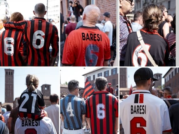 Milano, i tremila dell'addio a Franco Baresi: alle transenne dall'alba, arrampicati sui ponteggi. Il silenzio, poi un boato: «C'è solo un Capitano»